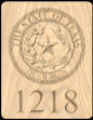 Texas Seal Address Sign Shown on oak